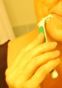 My biggest beauty secret is that I shave every day! It's the least feminine thing about me, having a hairy chin, and I've taken great pains to keep it a secret All. These. Years. But this year I'm 62 and starting new, and one of my goals is to speak what's hidden. SO. Here I am ~ hairy chin or shaved, it's still ME :)                                                                                                 For years I used to pluck with tweezers, but that took so much TIME. Especially as the number of hairs seemed to keep multiplying. In college, I decided once to rebel and go "au naturel"~ and let it all grow (chin, legs, armpits). That lasted about a week. I just couldn't embrace those two furry patches on my face...so off they came, and I quietly rejoined the smooth is beautiful mainstream.                                                            I wasn't thrilled about tweezing, though, so it was a revelation when I saw a woman in a public bathroom one day doing the unthinkable: SHAVING! In 7 seconds, I now accomplish what once took an hour. The only problem? Doing it without being seen. Now that I've 'fessed up, maybe you'll catch me one of these days. At least I'm out of the closet now!