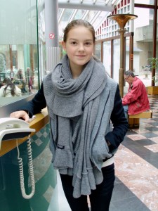 In the lobby waiting for her mom....